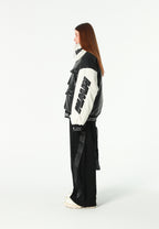 Chaqueta Iconic Logos efecto piel colorblock con cuello alto y cuatro bolsillos | MWM [PS_COLORS:BLACK]
