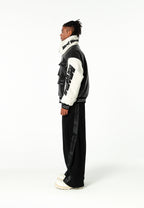 Chaqueta Iconic Logos efecto piel colorblock con cuello alto y cuatro bolsillos | MWM [PS_COLORS:BLACK]