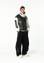 Chaqueta Iconic Logos efecto piel colorblock con cuello alto y cuatro bolsillos | MWM [PS_COLORS:BLACK]