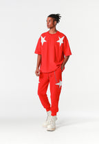 Pantalón jogger Wings con parches de estrellas y cadena lateral | MWM [PS_COLORS:RED]