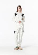 Pantalón jogger Wings con parches de estrellas y cadena lateral | MWM [PS_COLORS:WHITE]
