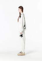 Pantalón jogger Wings con parches de estrellas y cadena lateral | MWM [PS_COLORS:WHITE]