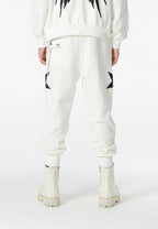 Pantalón jogger Wings con parches de estrellas y cadena lateral | MWM [PS_COLORS:WHITE]