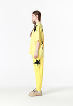 Pantalón jogger Wings con parches de estrellas y cadena lateral | MWM [PS_COLORS:YELLOW]
