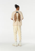 Camiseta Wings de corte relajado con estrellas frontales y doble parche de alas en la espalda | MWM [PS_COLORS:BEIGE]