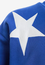 Sudadera de niño Wings de corte relajado con estrellas frontales y doble parche de alas en la espalda | MWM [PS_COLORS:BLUE]