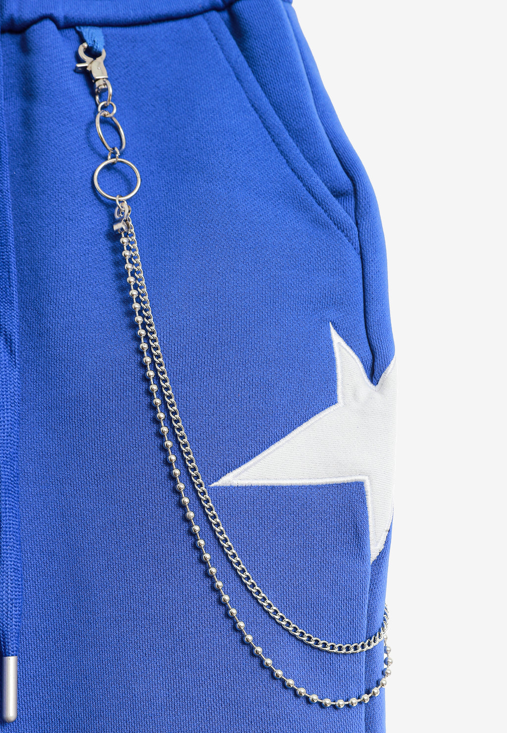 Pantalón jogger de niño Wings con parches de estrellas y cadena lateral | MWM [PS_COLORS:BLUE]