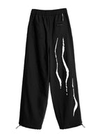 PANTALÓN PARCHEADO