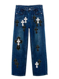 PANTALÓN VAQUERO CRUCES