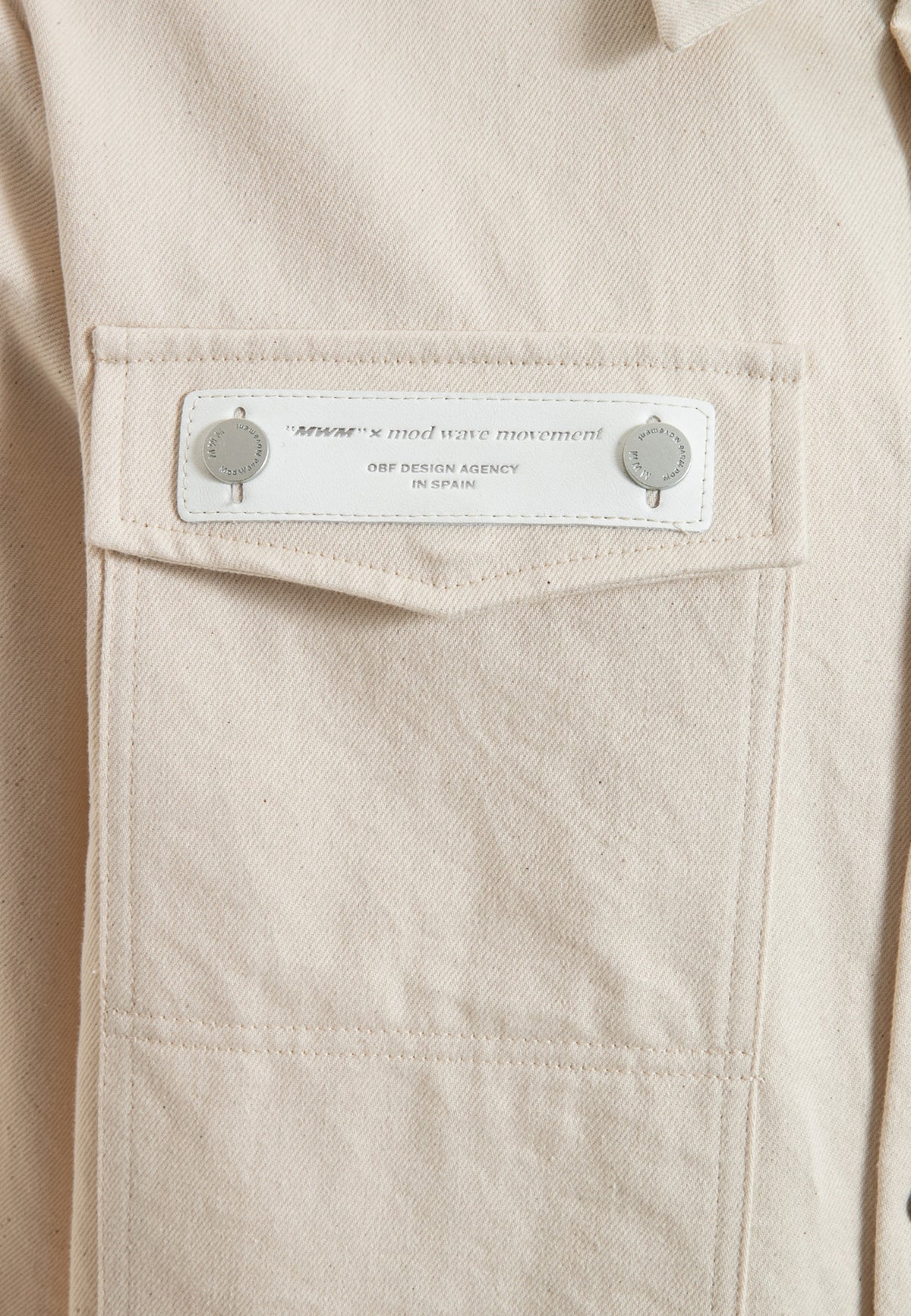 Sobrecamisa vaquera cropped con botones traseros | MWM