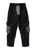 TROUSERS WITH MWM POCKETS
