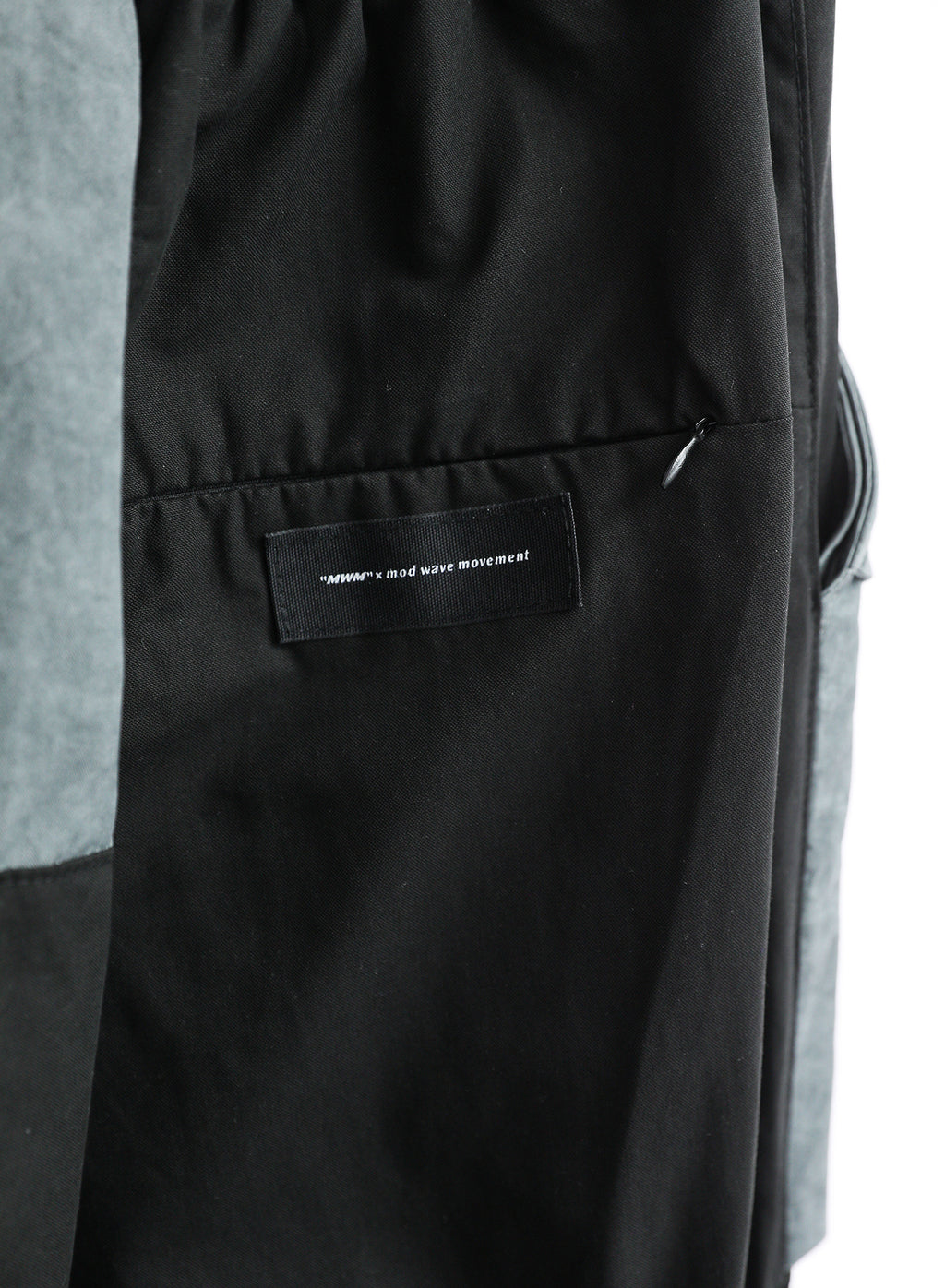 TROUSERS WITH MWM POCKETS
