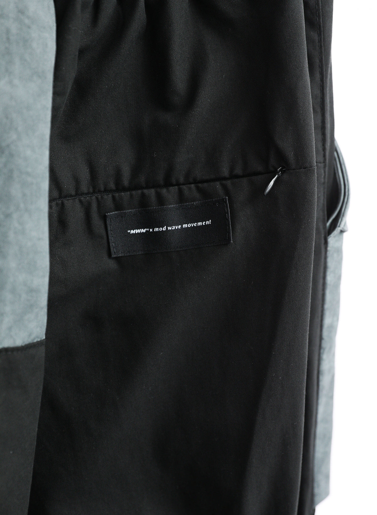 TROUSERS WITH MWM POCKETS