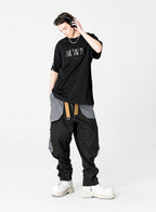 TROUSERS WITH MWM POCKETS
