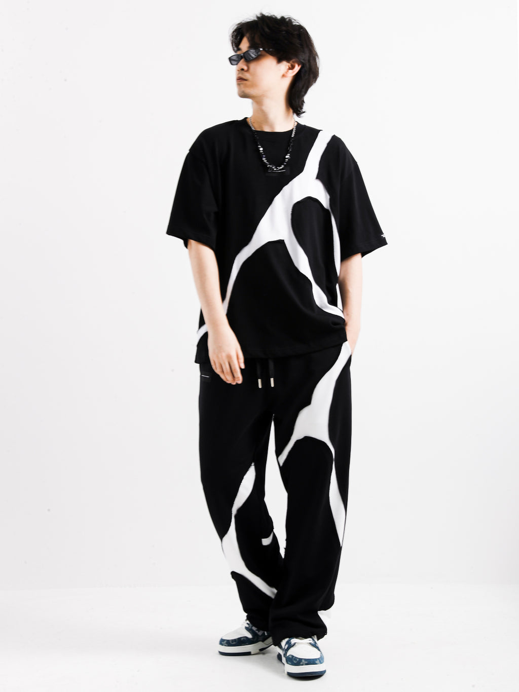 BLACK AND WHITE TROUSERS