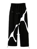 BLACK AND WHITE TROUSERS